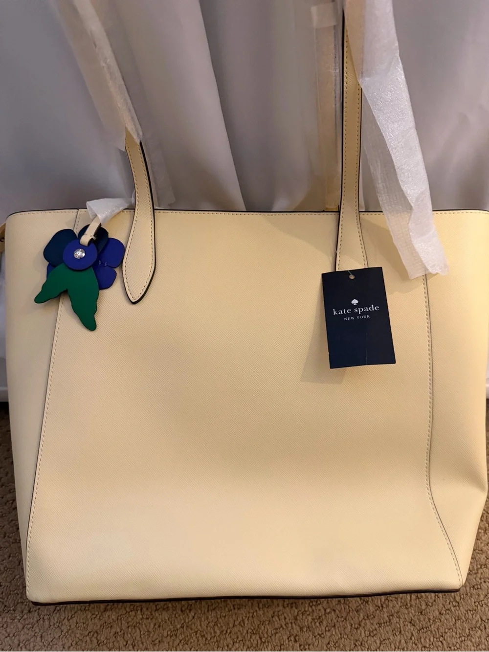 Kate Spade butter yellow tote with blue-green floral charm NWT